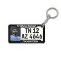 Keychain with personalized license plate design featuring a photo of a person and text.