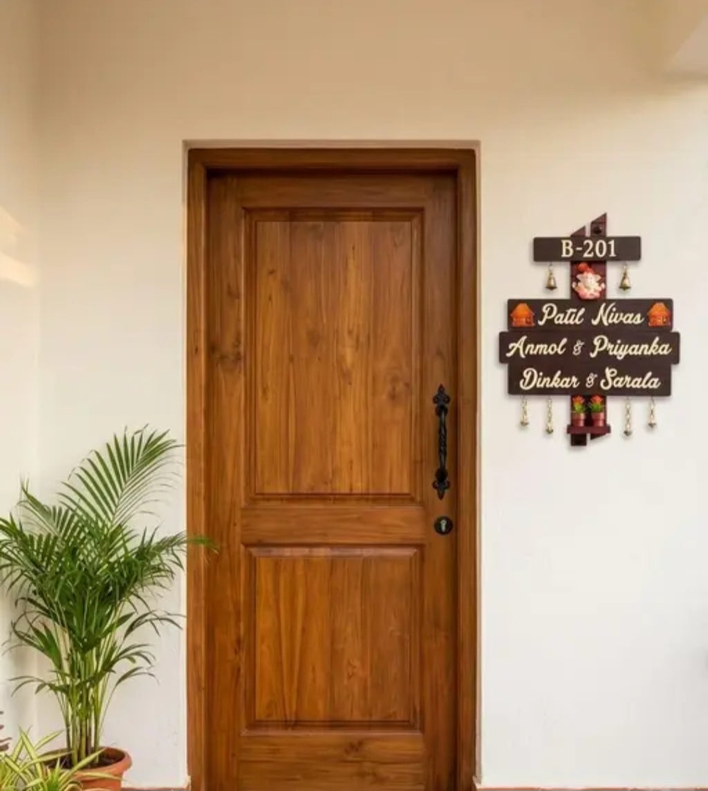 Premium Personalized Wooden Name Plate with Ganesh Idol, Brass Bells & Flower Pots | Dark Brown Home Entrance Name Board